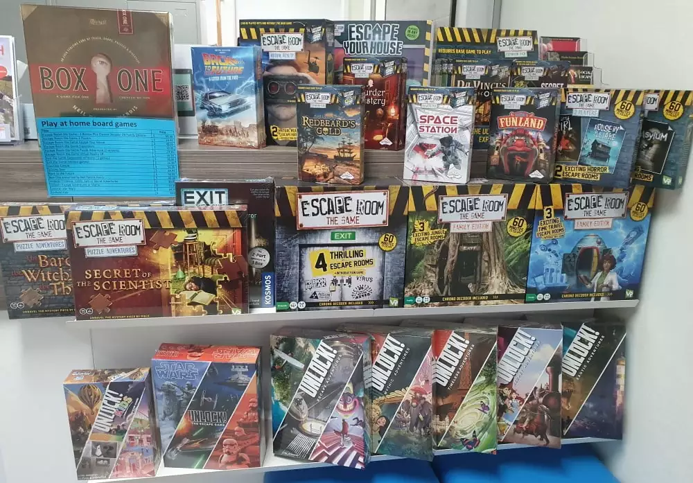 Large number of board games available onsite, including Escape Room The Game series, Unlock! series, even Neil Patrick Harris's Box One.