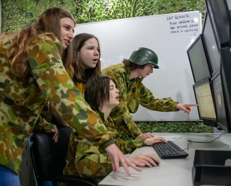 Teenagers in an escape room
